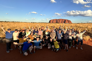 group in front of Uluru australia